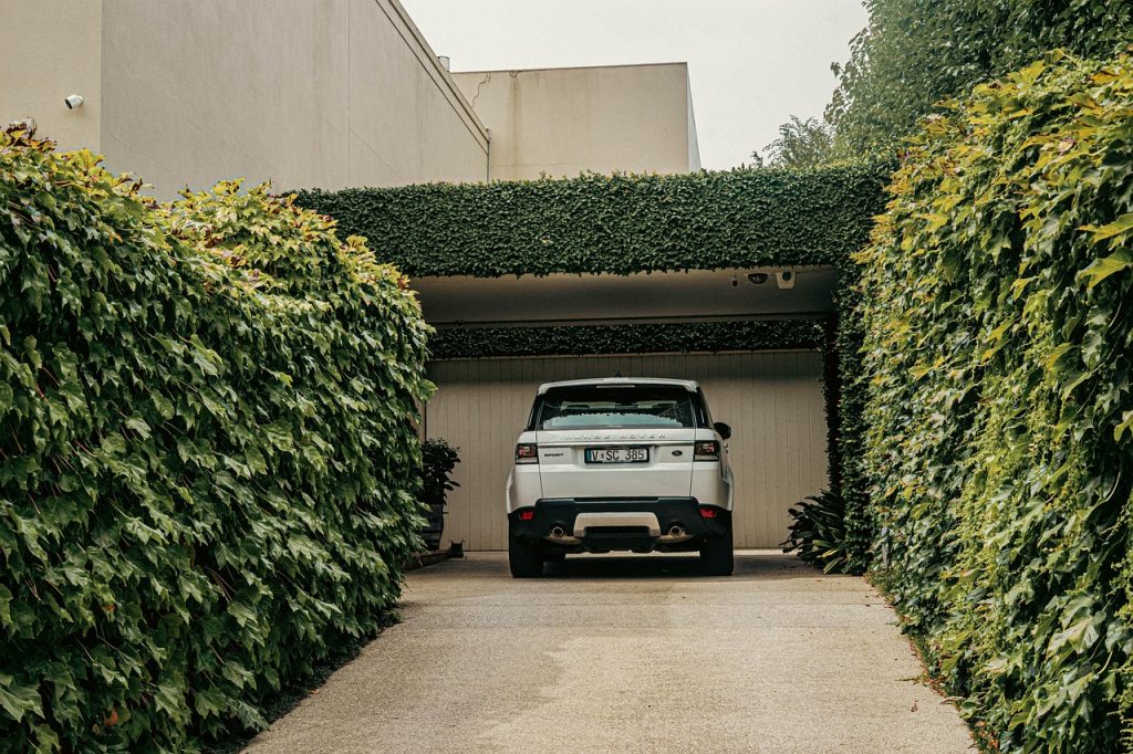 white SUV in a garage